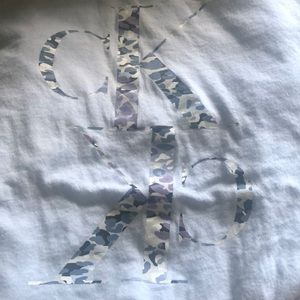 Women Calvin Klein short sleeve shirt, size XS…